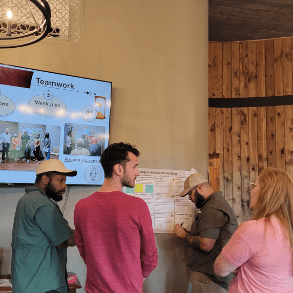 Enjoying archery in the natural beauty of the wooded hillside at Ancient Lore Village